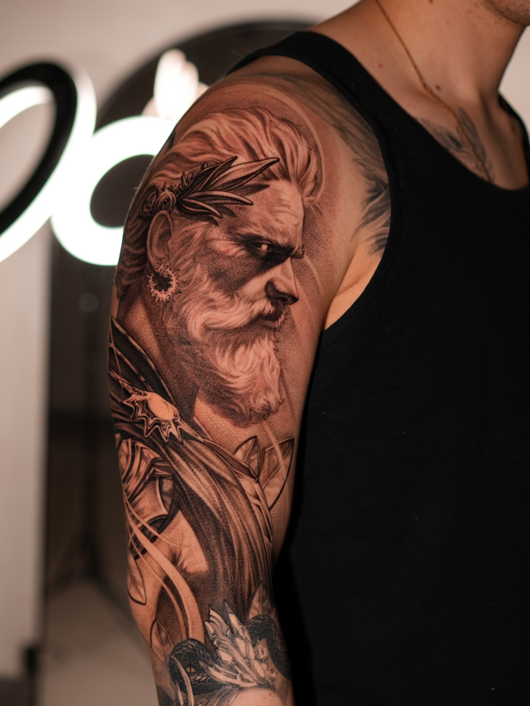 Realism Greek god sleeve tattoo
